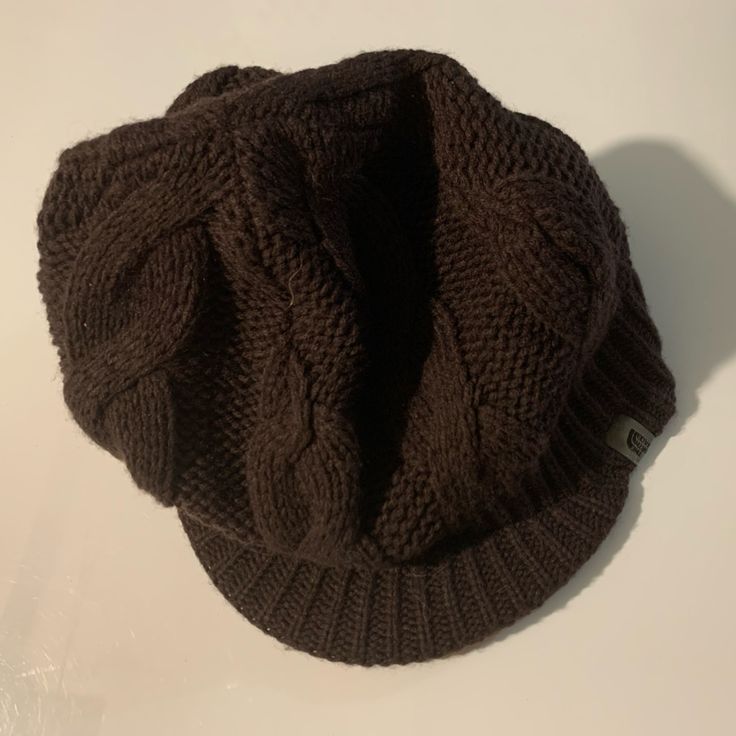 This Dark Brown Cable Knit Beanie Has A Brim Like A Hat Unisex For Men Or Women One Size Bought New And Removed Tags But Never Used Can’t Find Exact Item But Similar To The North Face Flip Billy Beanie The North Face Winter Beanie Hat, The North Face Winter Beanie, Casual Cable Knit Hat For Fall, The North Face Casual Winter Hats, Casual Brown Slouchy Beanie, Brown Slouchy Casual Beanie, Casual Slouchy Brown Beanie, The North Face Outdoor Hat, The North Face One Size Outdoor Hat