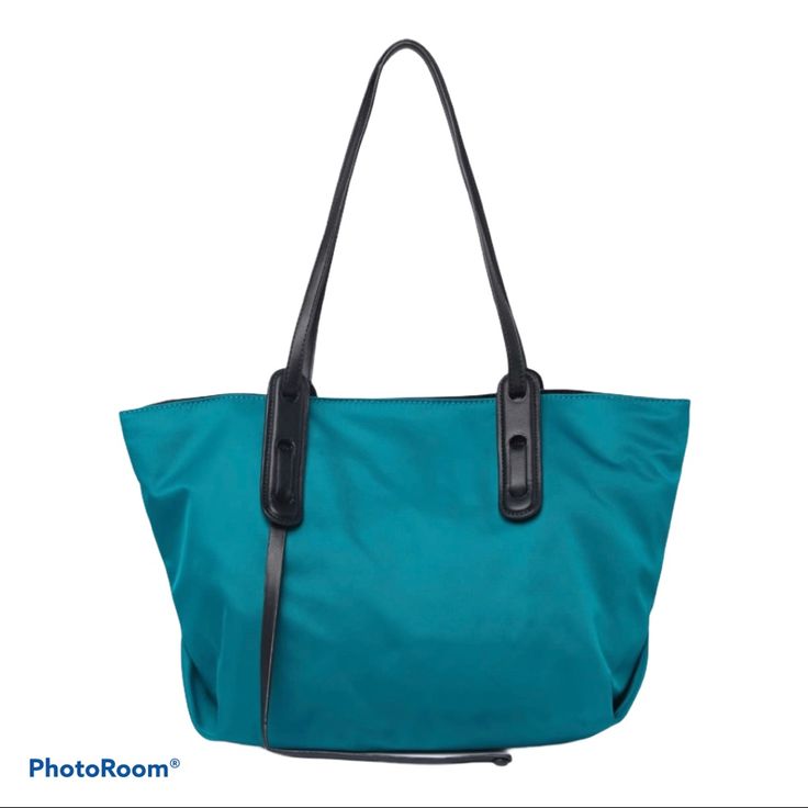 A Water Resistant Nylon Tote Bag Is The Perfect- Pick For On- The Style. Dual Shoulder Straps Top Magnetic Closure Water - Resistant Nylon Exterior Lined Interior Features Zip Wall Pocket And Lobster Clasp For Keychain Approx 10 1/2h X 14”W X 8”D Approx 10 1/2 Handle Drop Material: Textile Exterior And Lining Msrp: $190 Green Nylon Shoulder Bag For Shopping, Green Nylon Shoulder Bag With Double Handle, Large Capacity Nylon Shoulder Bag For Errands, Nylon Shoulder Bag With Leather Handles For Daily Use, Blue Nylon Shoulder Bag With Double Handle, Blue Nylon Shoulder Bag For Everyday Use, Nylon Shopping Bags With Handles, Blue Nylon Everyday Shoulder Bag, Everyday Blue Nylon Shoulder Bag