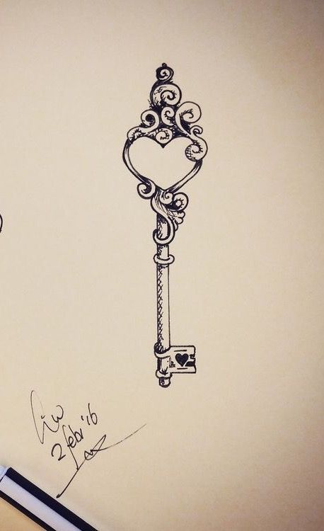 a drawing of an old key with a heart on it