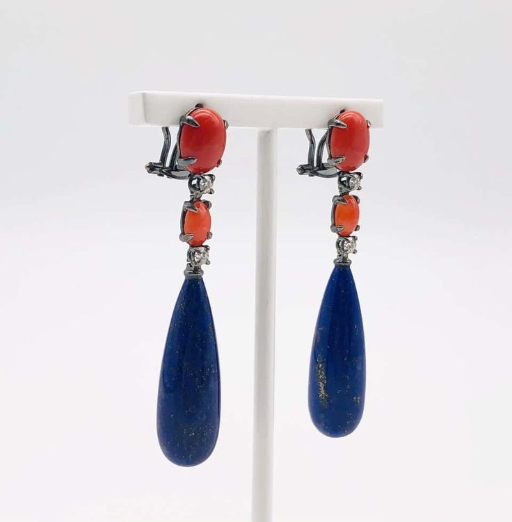 For Sale on 1stDibs - Wonderful Black Gold Coral, Diamonds and Lapis Lazuli Chandelier Earrings. Black Gold 18 Carat Diamonds 0,32 Carat Coral Lapis Lazuli Evening Multi-stone Drop Earrings, Multi-stone Drop Earrings For Evening, Evening Drop Shape Clip-on Jewelry, Evening Clip-on Drop Jewelry, Clip-on Drop Jewelry For Evening, Random Objects, Diamond Chandelier Earrings, Diamond Chandelier, Gold Chandelier Earrings