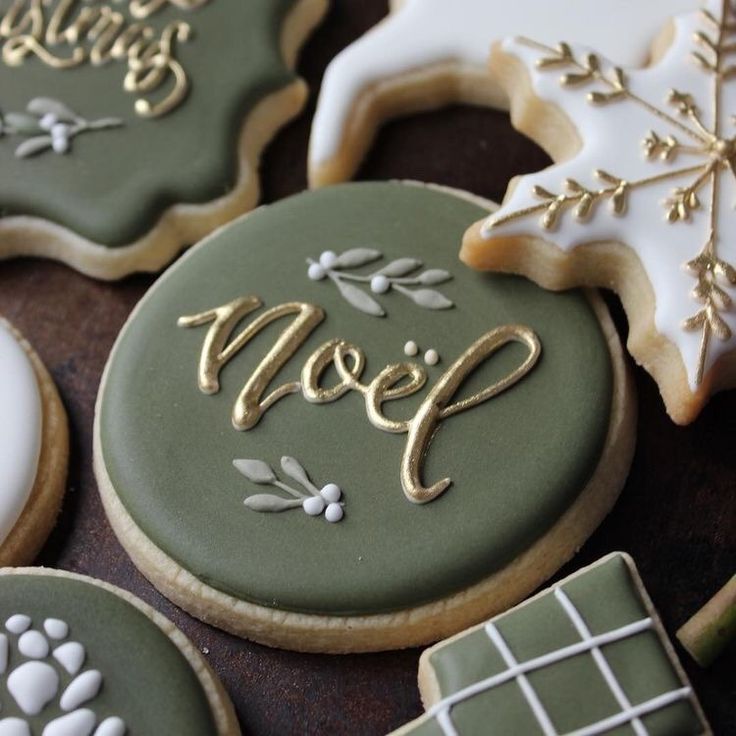 decorated cookies with the word noel on them