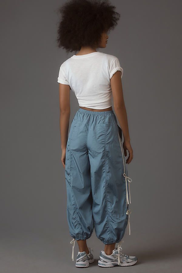 We have found this style runs large; we recommend sizing down for an ideal fit Nylon Side slant pockets Back pockets Pull-on styling Machine wash Imported | Full Twist Pants by Daily Practice by Anthropologie in Blue, Women's, Size: S P, Nylon Sporty Parachute Pants With Cargo Pockets And Tapered Leg, Athleisure Parachute Pants With Side Pockets And Loose Fit, Sporty Wide Leg Parachute Pants With Hip Pockets, Sporty Nylon Bottoms With Side Pockets, Athleisure Parachute Pants With Loosely Fitted Hips, Athleisure Parachute Pants With Loosely Fitted Hips And Pockets, Sporty Parachute Trousers With Hip Pockets, Sporty Straight Leg Parachute Pants With Hip Pockets, Sporty Straight Leg Parachute Pants