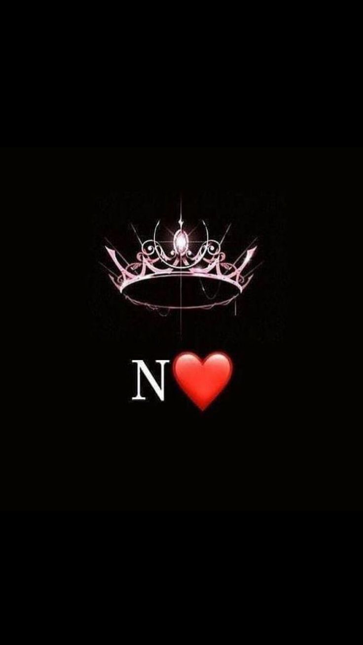 a red heart with a crown on it and the word n in front of it