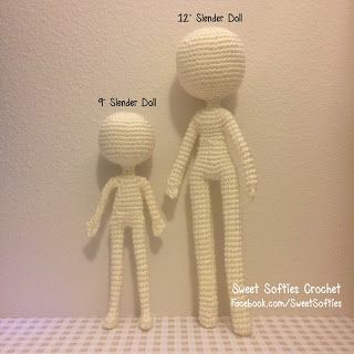 two crocheted dolls standing next to each other