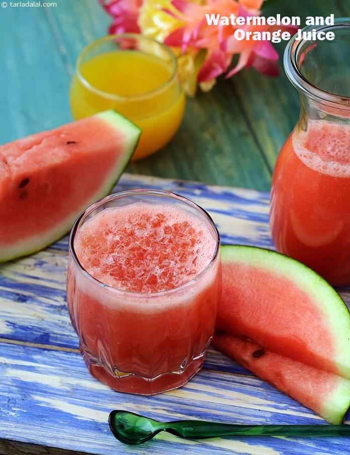 watermelon juice in a glass next to slices of watermelon