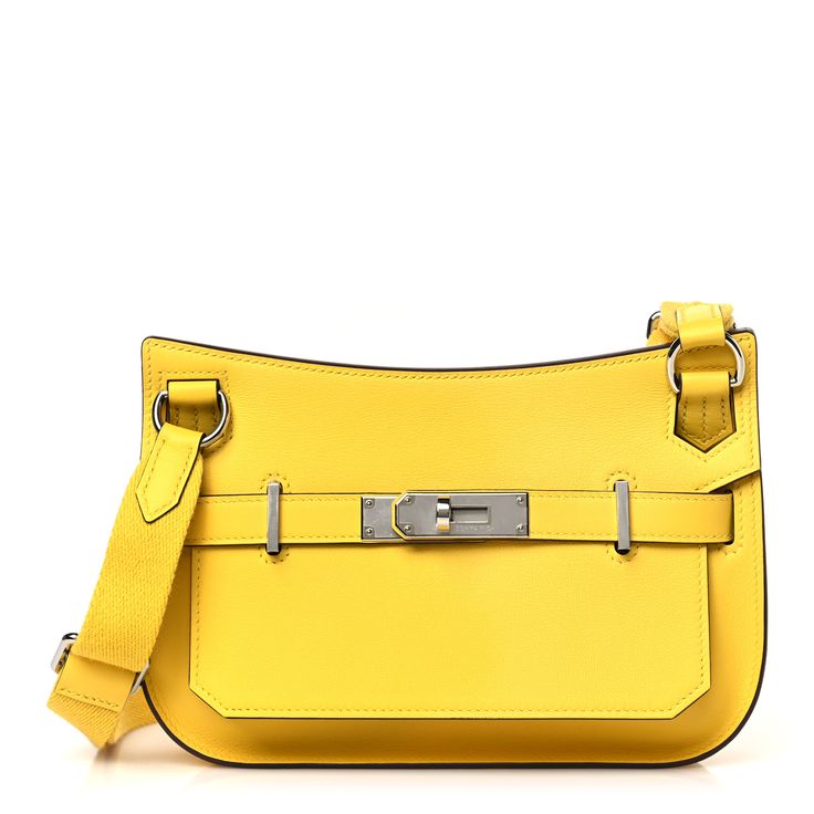 This is an authentic HERMES Swift Mini Jypsiere in Jaune De Naples. This stylish shoulder bag is crafted of evercolor leather in yellow. The bag features a crossbody strap with palladium hardware and a broad front flap that closes with a palladium turn lock. The flap opens to a yellow chevre goatskin leather interior with a patch pocket. Mini Jypsiere, Hermes Crossbody Bag, Stylish Shoulder Bag, Hermes Bags, Leather Interior, Naples, Crossbody Strap, Patch Pocket, Swift