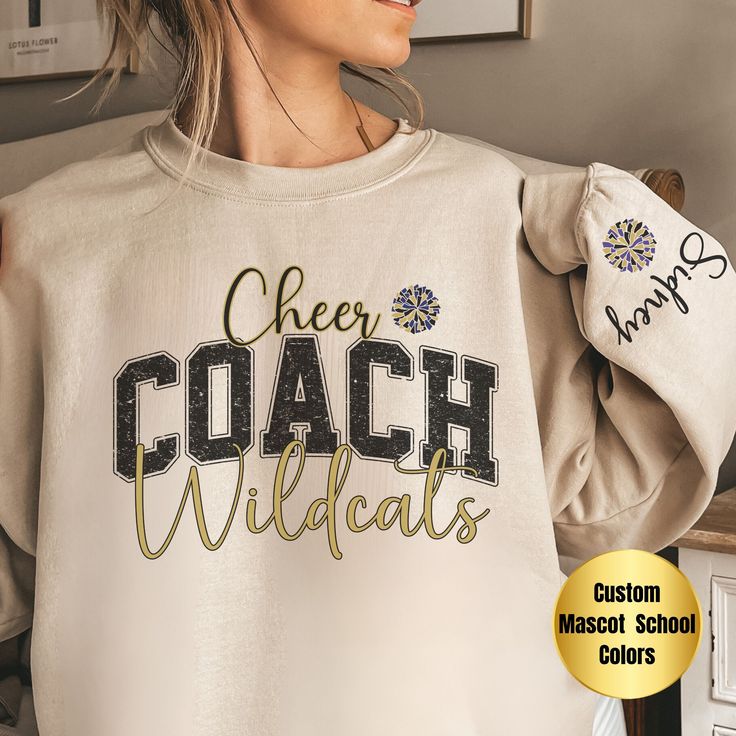 Elevate team spirit with our Custom Cheer Coach Sweatshirt - a cozy blend of comfort and personalization. Ideal for any occasion, this unisex heavy blend crewneck sweatshirt offers pure comfort with a touch of style. Crafted from a medium-heavy fabric blend of 50% cotton and 50% polyester (8.0 oz/yd this sweatshirt provides a warm and cozy feel, making it the perfect choice for those colder months. The classic fit, paired with the crew neckline, ensures a comfortable and clean-cut style - a vers Cheer Coach Svg, Coach Sweatshirt, Cheer Coach Shirts, Coach Svg, Cheer Coach Gifts, Cheerleading Coaching, Cheer Pom Poms, Coach Shirt, Cheer Practice