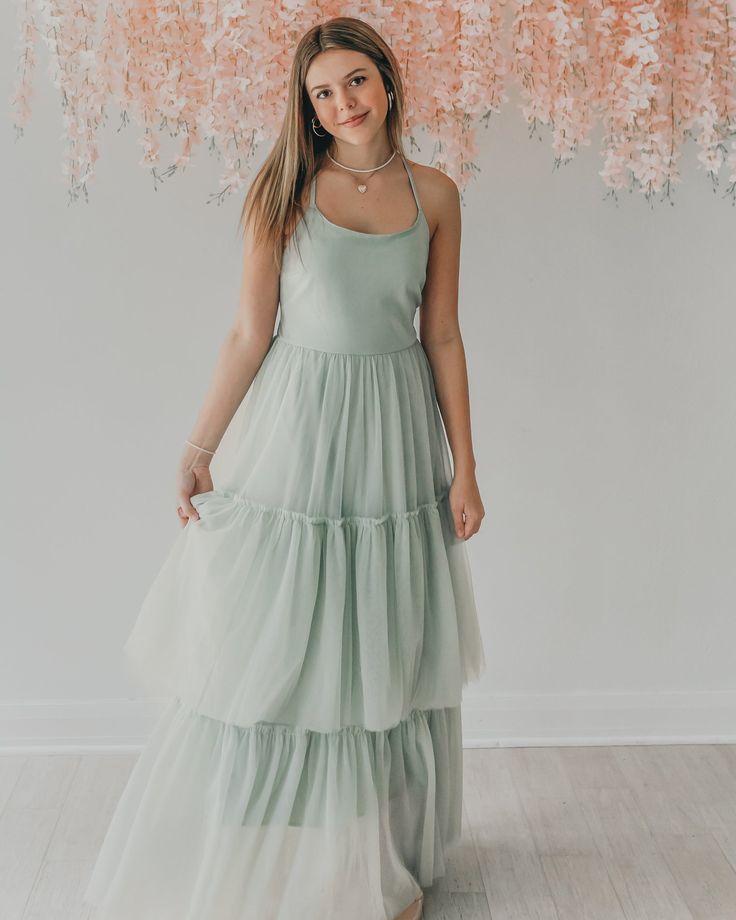 Some dresses are just made for beautiful destinations. The Wendy dress is just that with soft tulle and a beautiful tie back for a look that is dramatic yet down to earth. This is the women's version in mint, made to match with the girl's Wendy, Juliet and Fawn dresses in separate listings. Summer Bridesmaid Dress With Flowy Skirt, Light Green Maxi Length Summer Dress, Green Summer Maxi Dress For Bridesmaids, Green Maxi Dress For Summer Bridesmaid, Green Summer Bridesmaid Maxi Dress, Green Tie Back Maxi Dress For Garden Party, Green Flowy Breezy Midi Dress, Breezy Flowy Green Midi Dress, Green Breezy Flowy Midi Dress