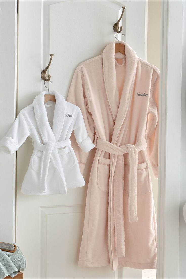 A simple way to turn any day into a spa day. Thick and plush, this robe envelops the wearer in luxurious warmth and comfort. The baby robe features the same quality (in miniature), so you can both feel extra pampered. White Cozy Sleep Robe, Cozy White Sleep Robe, Cozy White Robe For Relaxation, White Long Sleeve Bathrobe, White Long Sleeve Bath Robe, White Long Sleeve Home Robe, Dad Gojo, Pregnant Style, Baby Robes