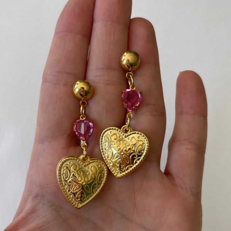 These earrings are made with gold plated surgical steel posts, vintage connectors + charms. Pierced Metal Heart Pendant Jewelry, Pierced Heart Pendant Jewelry, Metal Heart Pendant Jewelry With Matching Earrings, Double Heart Metal Earrings For Gift, Metal Jewelry With Matching Heart Pendant Earrings, Heart Pendant Jewelry With Matching Earrings, Heart Pendant Jewelry Set With Matching Earrings, Metal Heart Drop Earrings Pierced, Heart Charm Metal Earrings For Gift