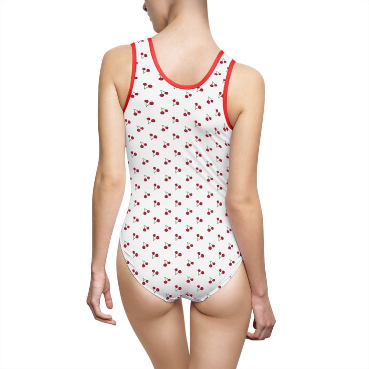 Cherry print swimsuit. Classic fit with modest back, chest, and bottom coverage. 83% Nylon 17% Spandex Light fabric (5.26 oz/yd² (178 g/m²)) Runs smaller than usual XS S M L XL 2XL 3XL Width at armpits, in 13.39 14.17 14.96 15.75 16.54 17.32 18.11 Waist width, in 11.81 12.60 13.39 14.17 14.96 15.75 16.54 Hip width, in 14.17 14.96 15.75 16.54 17.32 18.11 18.90 Side length, in 10.24 10.63 11.02 11.42 11.81 12.20 12.60 Length across front, in 21.26 21.65 22.05 22.44 22.83 23.23 23.62 Summer Fitted Printed Bodysuit, Sleeveless Cotton Bodysuit For Swimming, Fitted White Sporty Tankini, Fitted Casual Bodysuit For Poolside, Fitted Casual Elastane Swimwear, Casual Fitted Elastane Swimwear, Fitted Printed Bodysuit For Sunbathing, Fitted Casual Bodysuit For Sunbathing, Sleeveless Cotton Swimwear