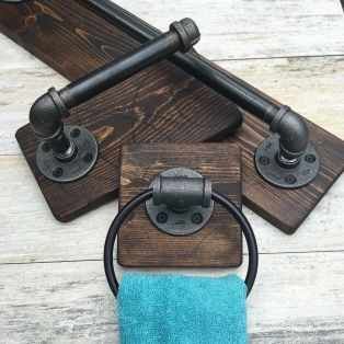 the towel holder is made out of wood and metal