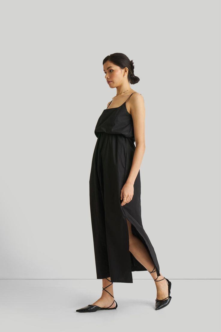 Elevate your style effortlessly with our chic Strappy Maxi Dress, perfect for those moments when you seek an elevated yet relaxed look. This dress features adjustable straps for a personalized fit and a sinched tie-front waist that accentuates your silhouette with a faux French tuck style. Embrace the ease and elegance of this relaxed-fit dress, complete with functional pockets on both sides and side slits for added comfort and movement. Ideal for warm weather occasions and versatile enough for Chic Spaghetti Strap Maxi Dress For Daywear, Chic Maxi Dress With Spaghetti Straps For Daywear, Chic Black Maxi Dress With Adjustable Straps, Elegant Maxi Dress With Adjustable Straps For Day Out, Elegant Maxi Dress With Adjustable Straps For Daywear, Elegant Daywear Maxi Dress With Adjustable Straps, French Tuck, Strappy Maxi Dress, Black Maxi