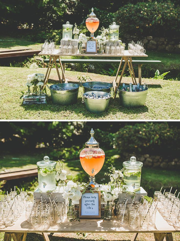 an outdoor bar set up with glasses and bottles