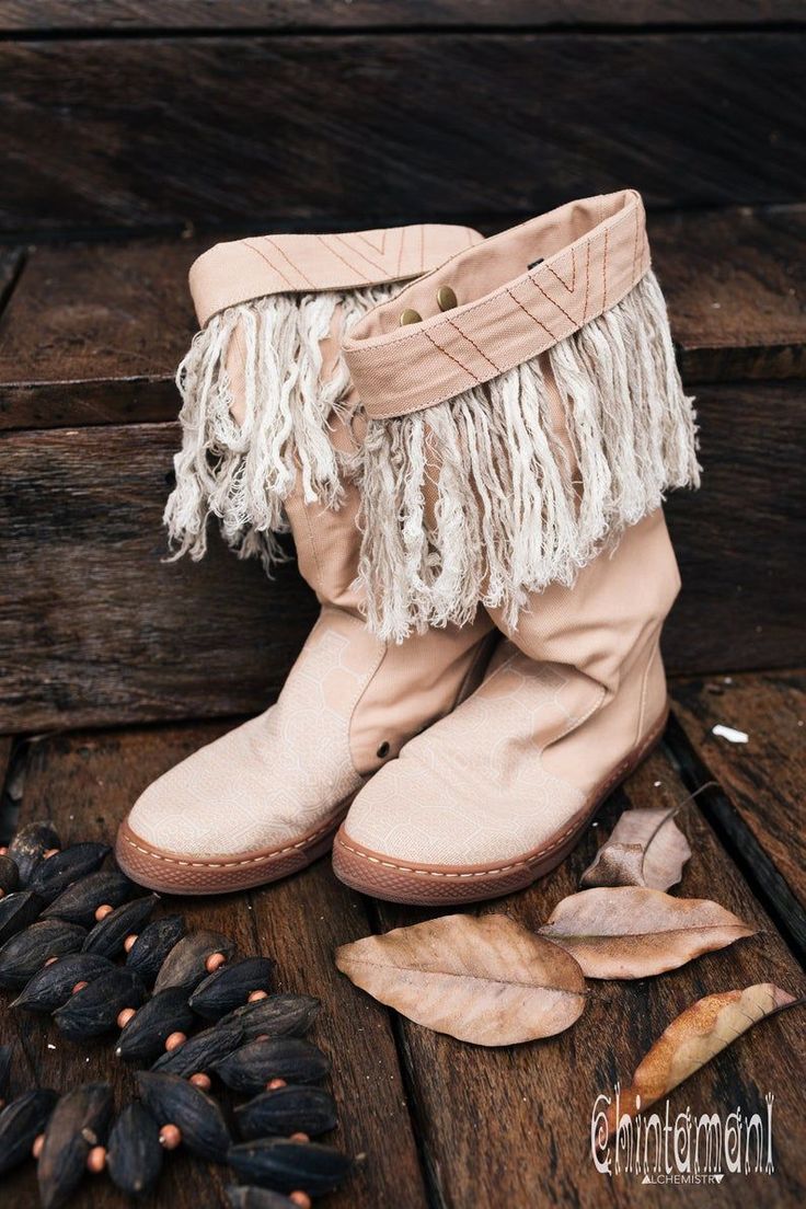 Beige Boho Vegan Shoes for Women  Our all time favorite cotton canvas   vegetarian boots also got Alma Libra Fringe upgrade! They are still same   very comfortable high boots with durable flat sole, that fit just   perfect and make your legs look slimmer, but now they also come with   gorgeous Long Linen Fringe decoration! The best part of it – the fringes   are removable! Bohemian Fall Boots With Flat Heel, Spring Canvas Boots With Round Toe, Bohemian Fringe Boots With Round Toe, Bohemian Style Fringe Boots With Round Toe, Fall Canvas Boots With Rubber Sole, Bohemian Boots With Flat Heel For Festival, Bohemian Boots With Round Toe For Festivals, Bohemian Round Toe Boots For Festival, Winter Festival Boots With Closed Toe