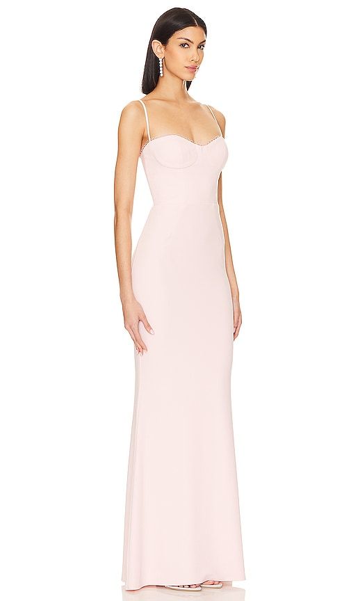 Find KATIE MAY Yasmin Gown on Editorialist. Katie May Yasmin Gown in Blush. - size L (also in M, S, XL, XS, XXS) Katie May Yasmin Gown in Blush. - size L (also in M, S, XL, XS, XXS) It's rare to find a dress that balances the line of charm and flirtation, but the Katie May Yasmin Gown in Blush has pulled it off. With a boned bodice and underwire bust, this gown exudes charm and allure. Crafted in crepe fabric with delicate neckline loops, it's the epitome of gentle femininity. Step into the allure of pastel perfection, perfect for any formal occasion. Don't just follow trends, set them.. Self: 97% polyester 3% spandex Lining: 100% polyester. Made in USA. Dry clean only. Partially lined. Hidden back zipper closure Adjustable shoulder straps. Boned bodice with underwire bust Crepe fabric wit Sweetheart Evening Dress, Floral Evening Dresses, Katie May, Boned Bodice, Designer Dresses For Women, Pink Gowns, Strapless Gown, Tulle Gown, Satin Gown