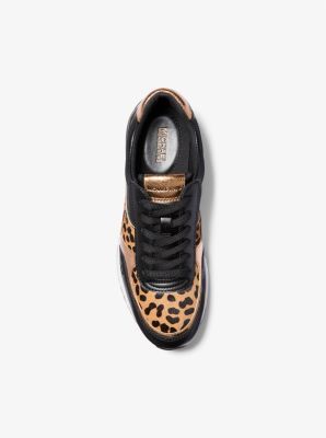 A retro running trainer with modern appeal, the Andi features a combination of leopard-print calf hair and smooth panels. Rubber soles provide plenty of support. For off-duty style at its smartest, team this lace-up pair with an oversized blazer and shorts. Leopard Print Leather Sporty Sneakers, Sporty Leopard Print Sneakers For Streetwear, Leopard Print Leather Sneakers With Branded Insole, Leopard Print Leather Low-top Sneakers, Leather Low-top Leopard Print Sneakers, Leopard Print Lace-up Sneakers, Sporty Low-top Leopard Print Sneakers, Sporty Leopard Print Low-top Sneakers, Sporty Leopard Print Sneakers With Round Toe