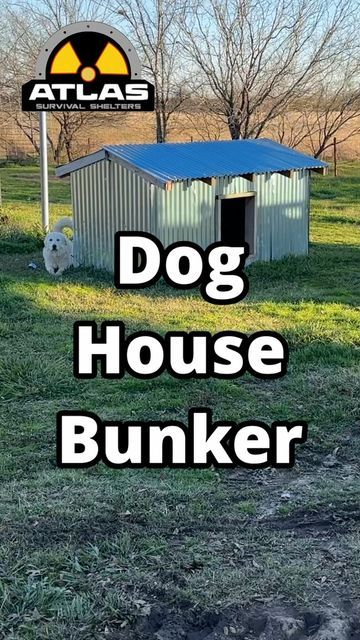 a dog house is in the middle of a field