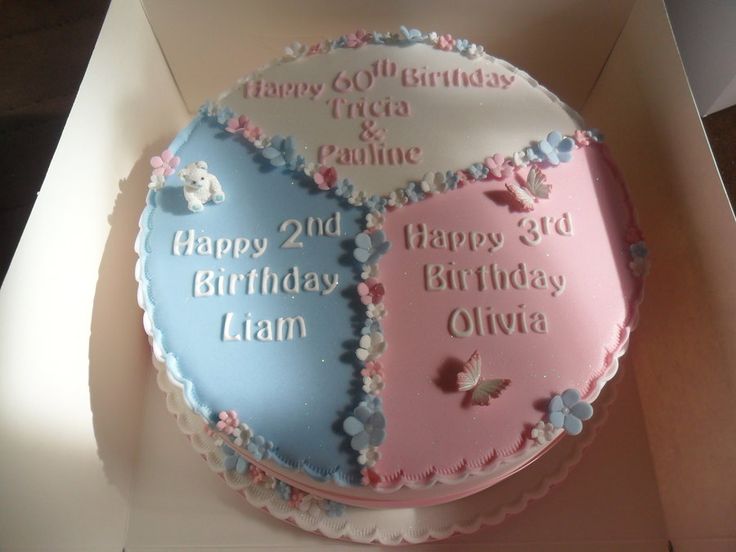 two birthday cakes in a box with butterflies on them