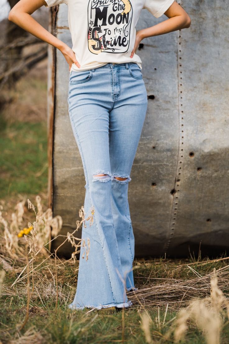 Mid to high rise Fringed hem Inseam: 34” Fabric: 98% Cotton, 2% Spandex Model is wearing a size S Flared Bottoms, Western Fits, Western Boutique, Western Style Outfits, Cowgirl Style, Style Outfits, Western Style, Flare Pants, Bell Bottoms