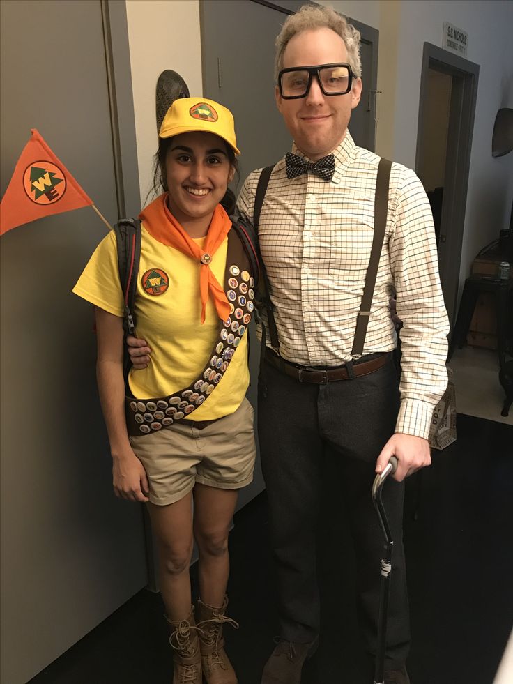 a man and woman dressed up in costumes