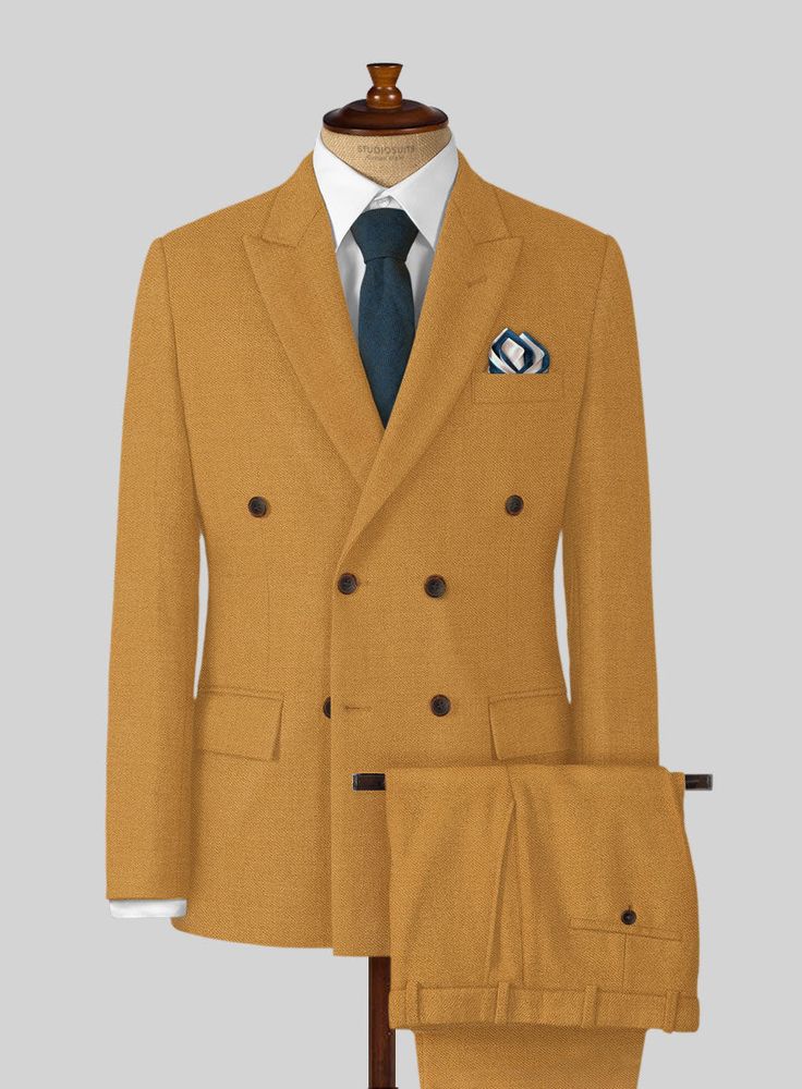 Give rustic shade suit a break and add try something fancy with our Naples Yellow Tweed Double Breasted Suit. Crafted from wool, the suit will make sure that you just wont't stand out of the crowd but also as the most debonair chap at the party. Wear over a button-down shirt, tailored trousers and brogues for a striking smart look. 
 
Look Includes   Naples Yellow Tweed Fabric  Double Breasted Jacket Style  Peak Lapel  Horn Brown Buttons  Single Vent  Three Cuff Buttons  Two welted back pockets Tailored Brown Wool Suit, Brown Wool Suits With Suit Collar, Tailored Wool Suits For Fall, Fitted Tweed Jacket In Suiting Fabric For Fall, Tailored Double-breasted Brown Suit, Single Breasted Tweed Suit For Work, Brown Tailored Double-breasted Suit, Wool Suit With Suit Collar For Fall, Fall Wool Suit With Suit Collar