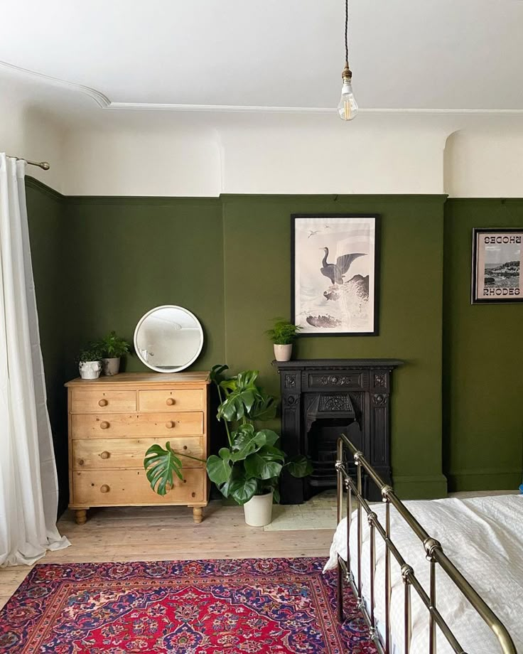 a bed room with a neatly made bed and a rug