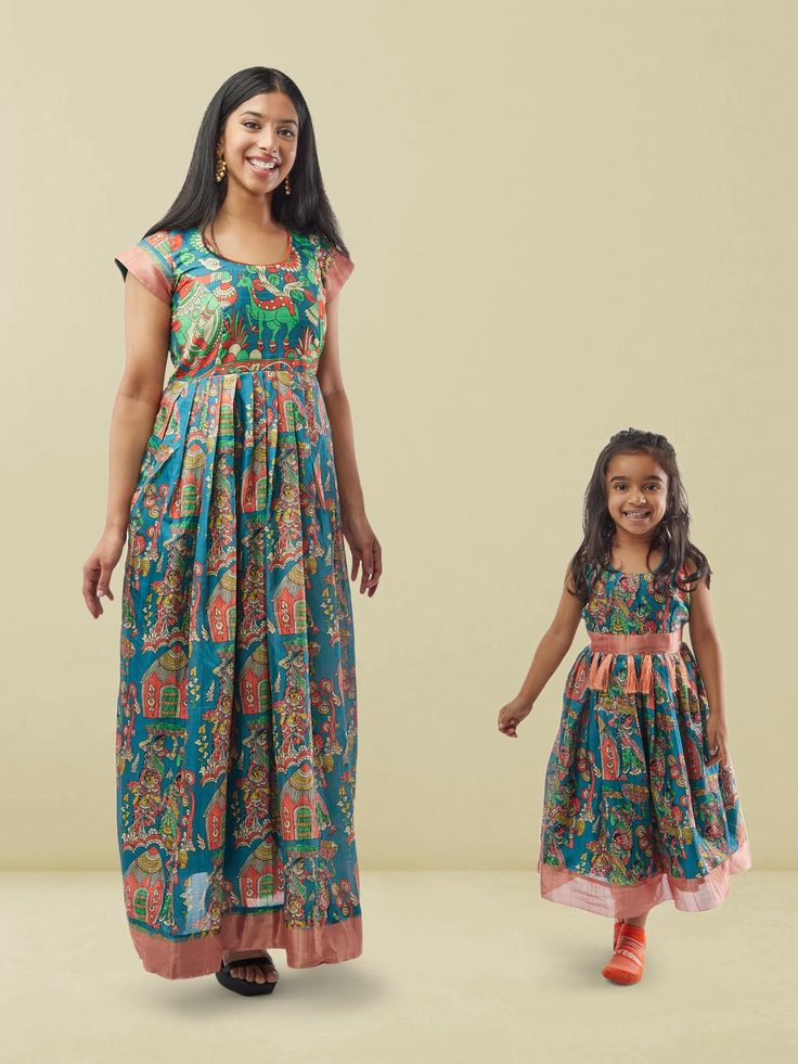 Blue Kalankari Print Mom and Daughter Matching Dresses | Muvvas Boutique | Mother Daughter Dress Matching Festive Sleeveless Blue Kurta, Blue Sleeveless Kurta For Festive Occasions, Festive Blue Sleeveless Kurta, Blue Bollywood Style Kurta With Floral Print, Blue Bollywood Sets With Floral Print, Blue Anarkali Kurta With Floral Print, Anarkali Blue Kurta With Floral Print, Bollywood Style Blue Floral Print Dress, Blue Sleeveless Anarkali Set