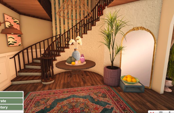 a living room filled with furniture next to a spiral stair case and potted plant