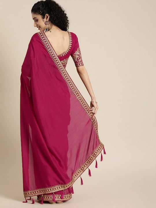 Magenta pink solid saree and has a zari borderThe model is wearing a stitched version of the blouse piece. The saree comes with an unstitched blouse piece. Eid Puja Pre-draped Saree With Embroidered Border, Bollywood Style Pre-draped Saree With Border For Eid, Navratri Pre-draped Saree With Border, Dola Silk Pre-draped Saree With Embroidered Border For Puja, Festival Georgette Pre-draped Saree With Border, Semi-stitched Traditional Wear With Border For Eid, Traditional Pink Pre-draped Saree With Embroidered Border, Semi-stitched Bollywood Blouse Piece With Embroidered Border, Pink Georgette Pre-draped Saree With Embroidered Border