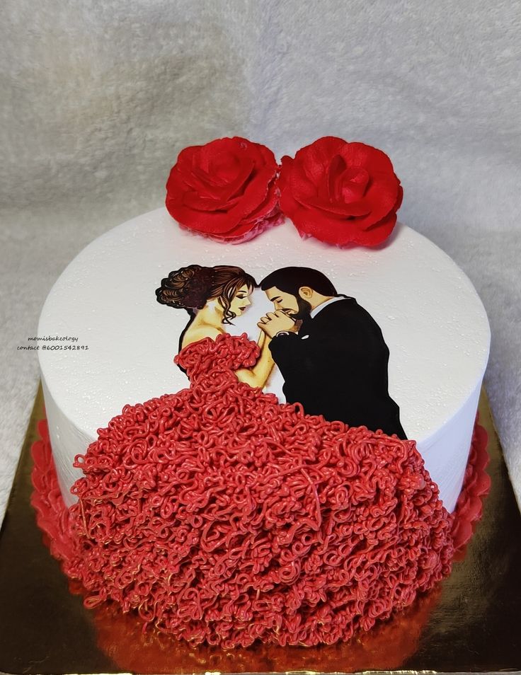 a wedding cake decorated with red icing and roses