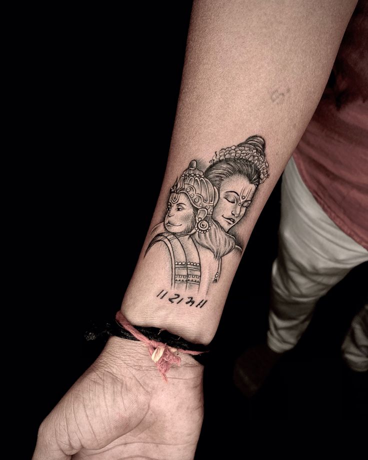 a woman's arm with a tattoo on it and two women holding each other