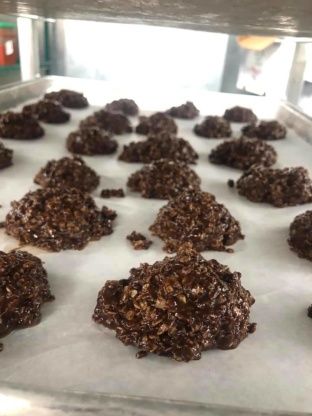 chocolate cookies on a baking sheet ready to go into the oven