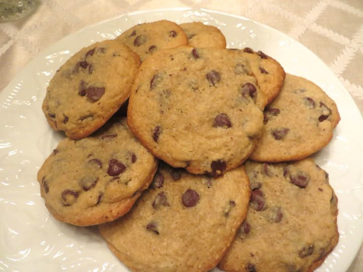 a white plate topped with chocolate chip cookies