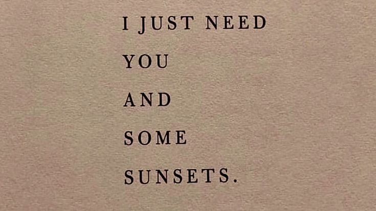 an old typewriter with the words i just need you and some sunsets