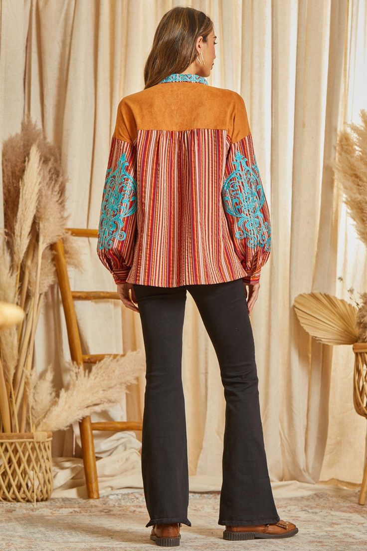 This beautiful striped pattern blouse features a suede panel with lace up detail. This top features gorgeous embroidery with long sleeves. One of a kind. Non sheer, woven. Long Sleeve Peasant Top With Boho Print For Fall, Fall Cotton Peasant Top With Boho Print, Long Sleeve Boho Print Peasant Top For Fall, Brown Boho Print Blouse For Fall, Brown Floral Embroidered Blouse For Fall, Bohemian Peasant Top With Embroidered Sleeves For Fall, Brown Floral Embroidery Blouse For Fall, Fall Bohemian Peasant Top With Embroidered Sleeves, Brown Long Sleeve Peasant Top For Fall