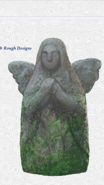 an angel statue with moss growing on it