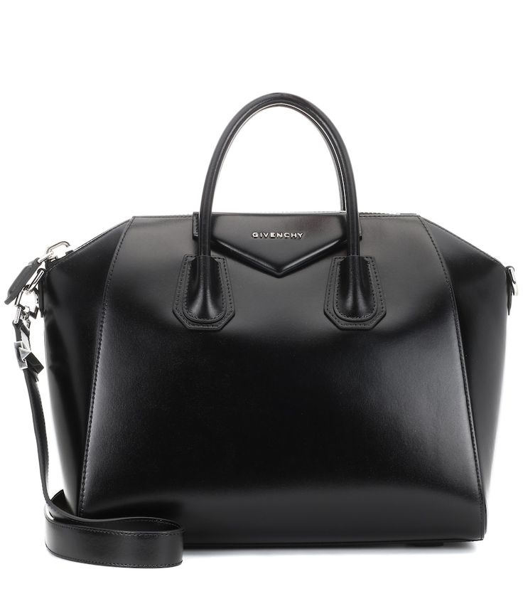 Givenchy's Antigona tote is the bag topping everyone's wish list. Coveted for its tough, structured silhouette, this polished black leather design has been carefully crafted in Italy and is a sure-fire investment for seasons to come | Givenchy Antigona Medium leather tote Antigona Givenchy, Givenchy Antigona Medium, Iphone Bag, Givenchy Antigona, Prada Handbags, Givency Antigona Bag, Shoulder Messenger Bag, Wallet Bag, Small Shoulder Bag