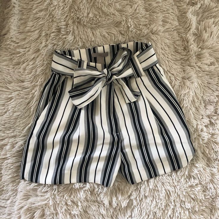 H&M. White High-Waisted, Black-Striped Shorts. Loose & Flowy. Super Comfortable. Cute Removable Tie Belt. Never Worn. Gained Some Weight, So They Don’t Fit Me Anymore. Casual White Shorts With Banded Waist, Chic Striped High-waisted Shorts, White Shorts With Banded Waist For Summer, Summer White Shorts With Banded Waist, White Summer Shorts With Banded Waist, Chic High Waist Striped Shorts, Chic Striped Shorts With Elastic Waistband, H&m Bottoms With Built-in Shorts, H&m High Waist Bottoms With Built-in Shorts