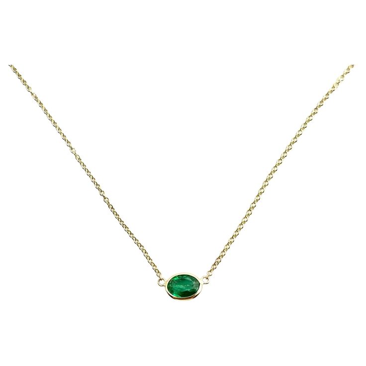 The bezel solitaire necklace combines vintage-inspired detail and modern appeal together for a look that’s timelessly elegant, simple, and classy. Each 14k solid gold bezel setting is hand-wrapped. We've built the necklace for versatility as the length of the chain can be adjusted to 14, 16, or 18 inches to suit individual preference. Emeralds represent the birth month of May. This gemstone is natural and is certified. This is 14k Solid Gold. (We do not sell filled or plated jewelry) Perfect for Elegant Oval Pendant Necklace With Bezel Setting, Classic Solitaire Gemstone Necklace For Formal Occasions, Oval Bezel Setting Necklace For Anniversary, Classic Emerald Birthstone Necklace For Formal Occasions, Classic Emerald Necklace As Birthstone For Formal Occasions, Classic Formal Solitaire Gemstone Necklace, Timeless Oval Solitaire Necklace For Formal Occasions, Classic Emerald Necklace For Anniversary, Formal Timeless Oval Solitaire Necklace