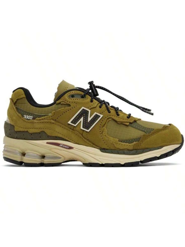 New Balance 
Khaki 2002R Sneakers 
Low-top paneled nubuck suede and ripstop sneakers in khaki. Stability Web technology. 
. Lace-up closure 
. Logo patch at padded tongue 
. Padded collar 
. Perforated detailing at heel counter 
. Logo appliqué at sides 
. Mesh lining 
. ABZORB® foam rubber midsole 
. Treaded N-ergy rubber outsole 
Supplier color: High desert/Dark moss/Black 
Upper: leather, textile. Sole: rubber. 
Made in Viet Nam. 
241402F128074 
Khaki 2002R Sneakers default         Sports & O Khaki Lace-up Sneakers For Streetwear, Green Nylon Hiking Sneakers, Khaki Sneakers With Rubber Sole For Outdoor, Khaki Sneakers With Rubber Sole For Outdoor Activities, Khaki Low-top Sneakers For Outdoor Activities, Casual Khaki Sneakers With Vibram Sole, Olive Low-top Sneakers For Outdoor, Khaki Lace-up Sneakers With Rubber Sole, Khaki Lace-up Sneakers With Vibram Sole