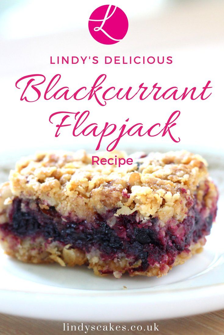 a close up of a plate of food with the words black curran flapjack recipe