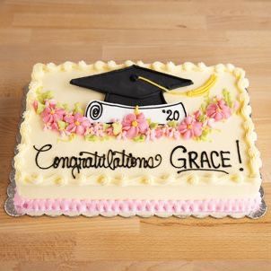 a graduation cake with congratulations grace written on it