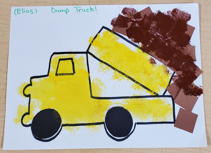 a child's drawing of a dump truck with brown and yellow paint on it