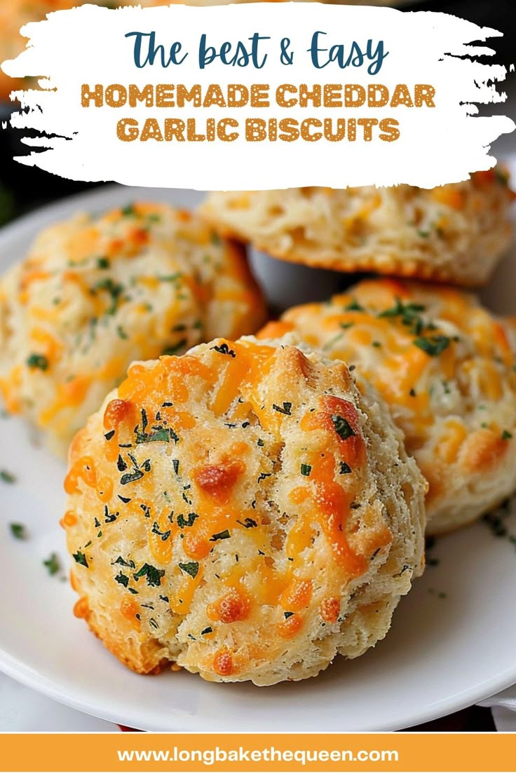 the best and easy homemade cheddar garlic biscuits on a white plate