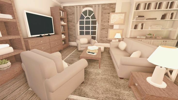 a living room filled with lots of furniture and a flat screen tv mounted to the wall