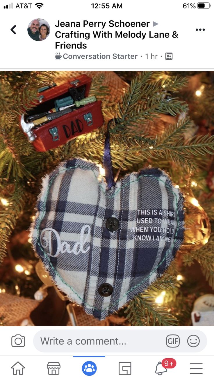 a heart ornament hanging from a christmas tree