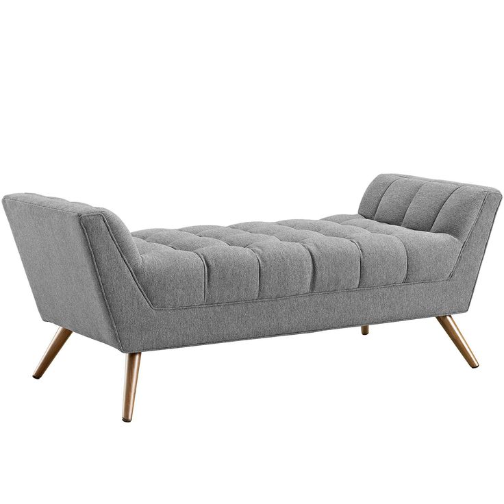 a gray couch with wooden legs on a white background