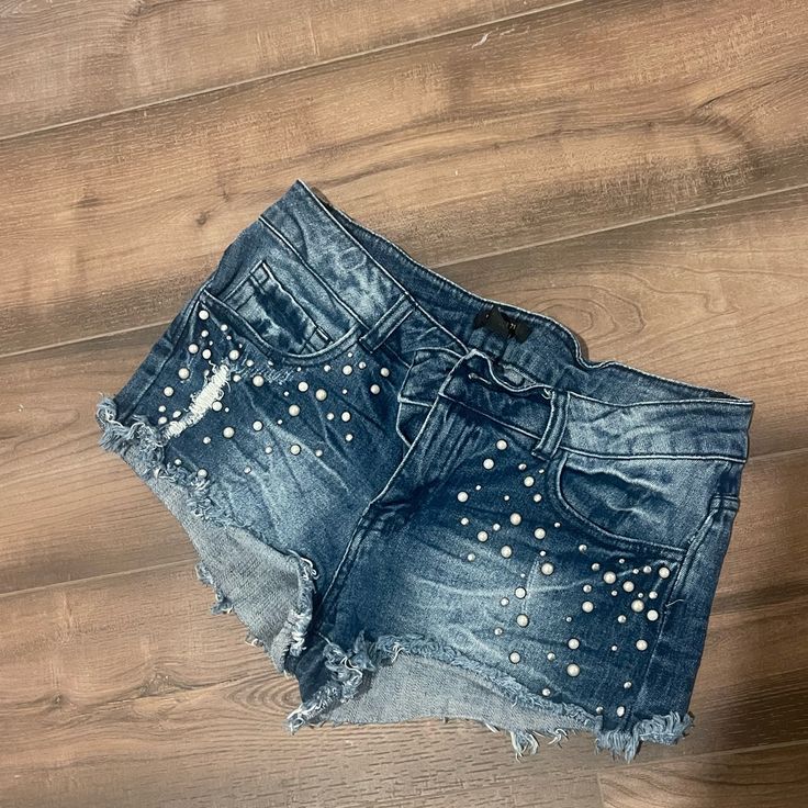 Forever 21 Embellished Pearl Jean Shorts Size 27 Never Worn Medium Wash Embellished Casual Bottoms, Casual Embellished Medium Wash Bottoms, Casual Embellished Summer Shorts, Embellished Jean Shorts For Summer, Casual Embellished Jean Shorts For Spring, Embellished Denim Jean Shorts, Embellished Denim Jean Shorts In Casual Style, Embellished Denim Jean Shorts Casual Style, Trendy Embellished Short Bottoms