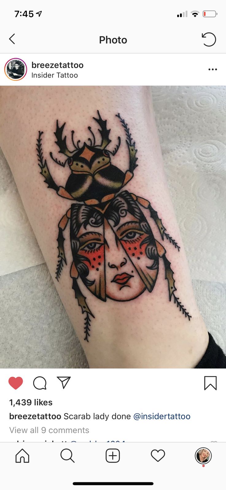 a lady bug tattoo on the left leg with an antelope in it's head